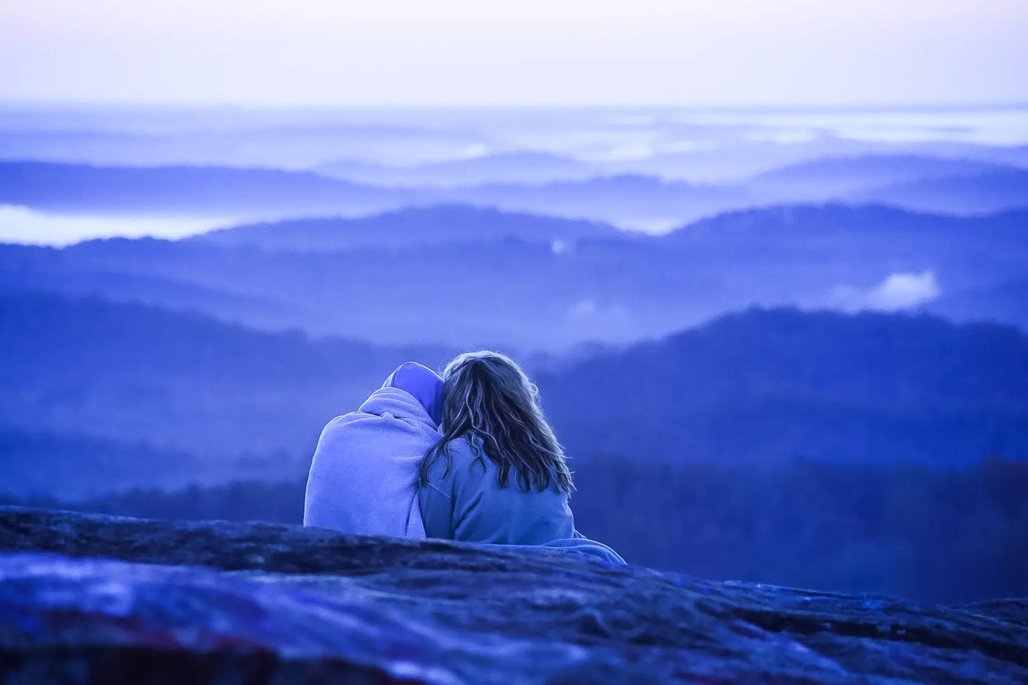 couple-cuddles-watching-over-nature